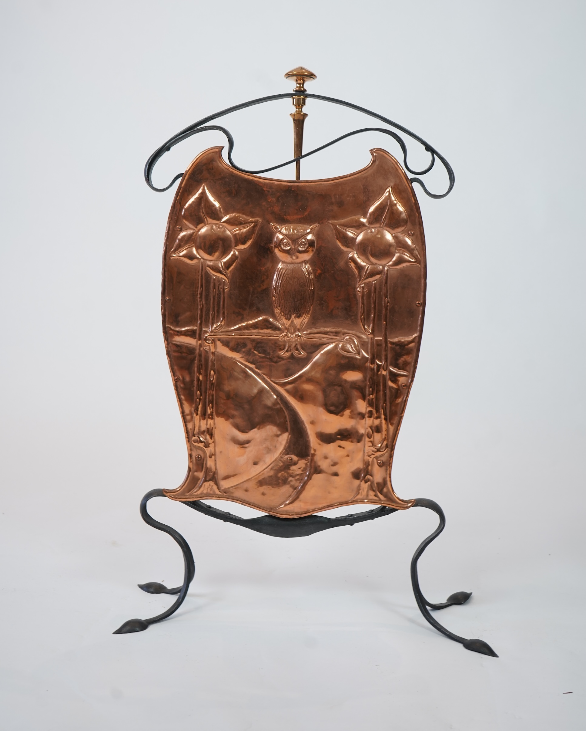 An Arts and Crafts copper and wrought iron fire screen